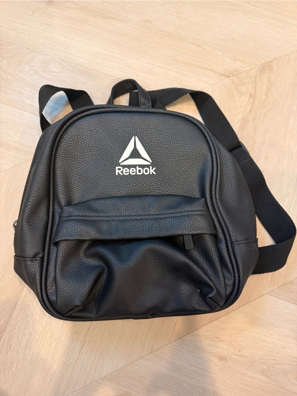 Mini Reebok Black Pebbled Sling Backpack